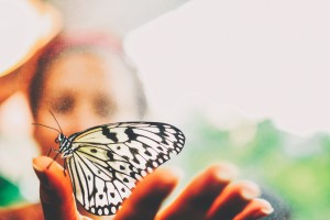 Woman-Holding-Butterfly-10-26