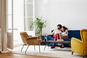 Couple-Sitting-On-Couch-031616