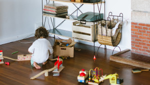 Child-Playing-In-Cluttered-Room-080216-HERO